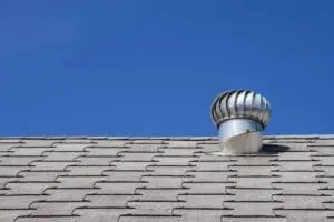 attic ventilation on top of a roof