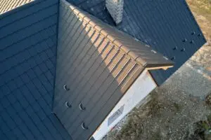 Aerial view of residential home with metal roof in Central Florida