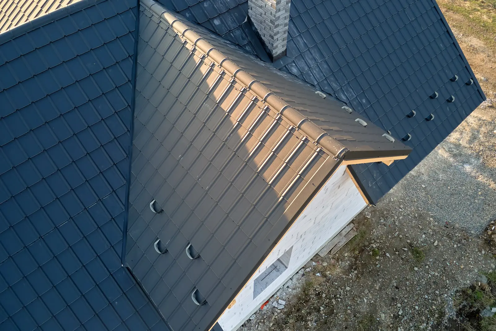 Aerial view of residential home with metal roof in Central Florida