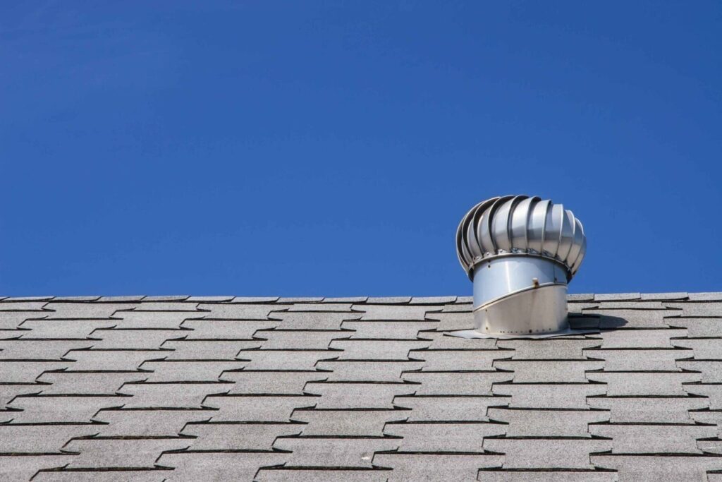 attic ventilation on top of a roof