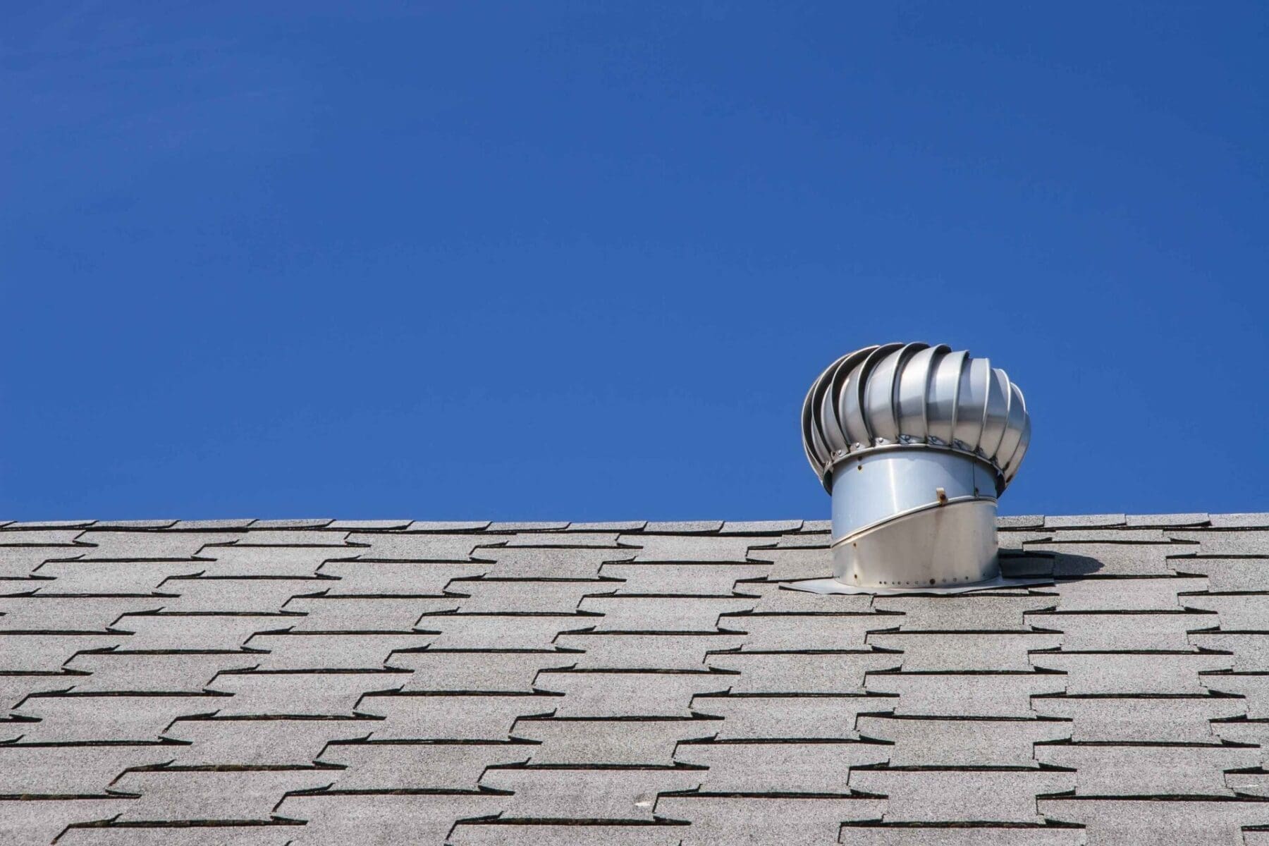 attic ventilation on top of a roof
