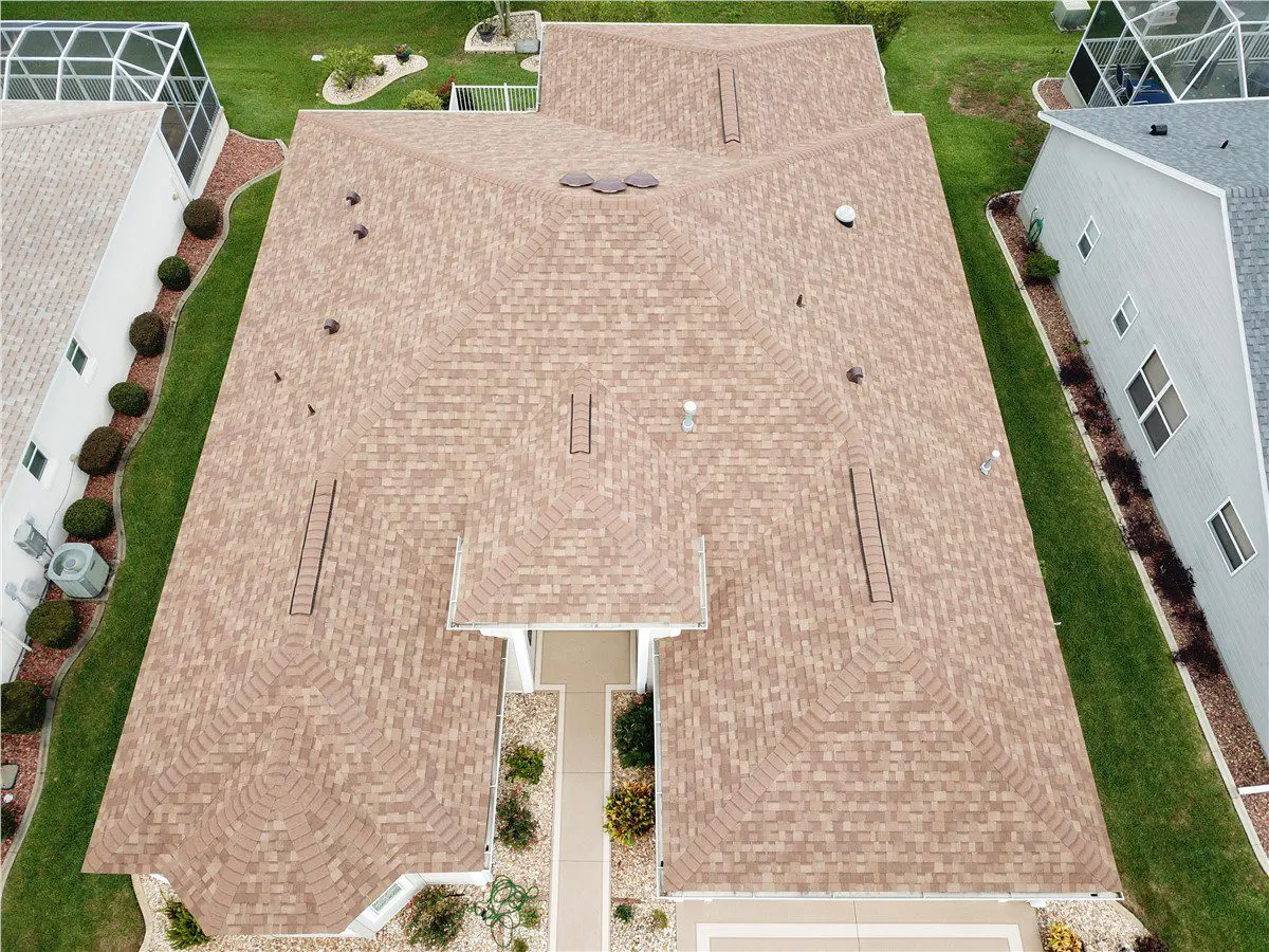 birdseye view of orange asphalt shingle roof
