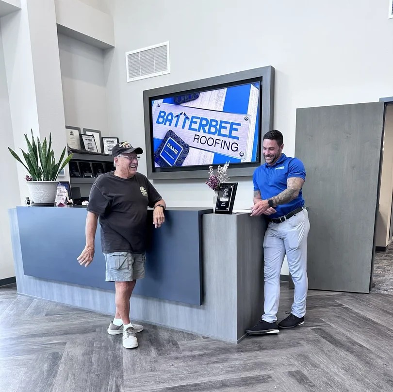 batterbee roofing customer talking to an employee